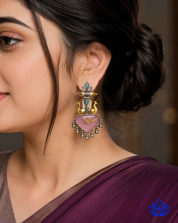 Layered dual-tone silver-plated finish creates a bold, contemporary earring edge.