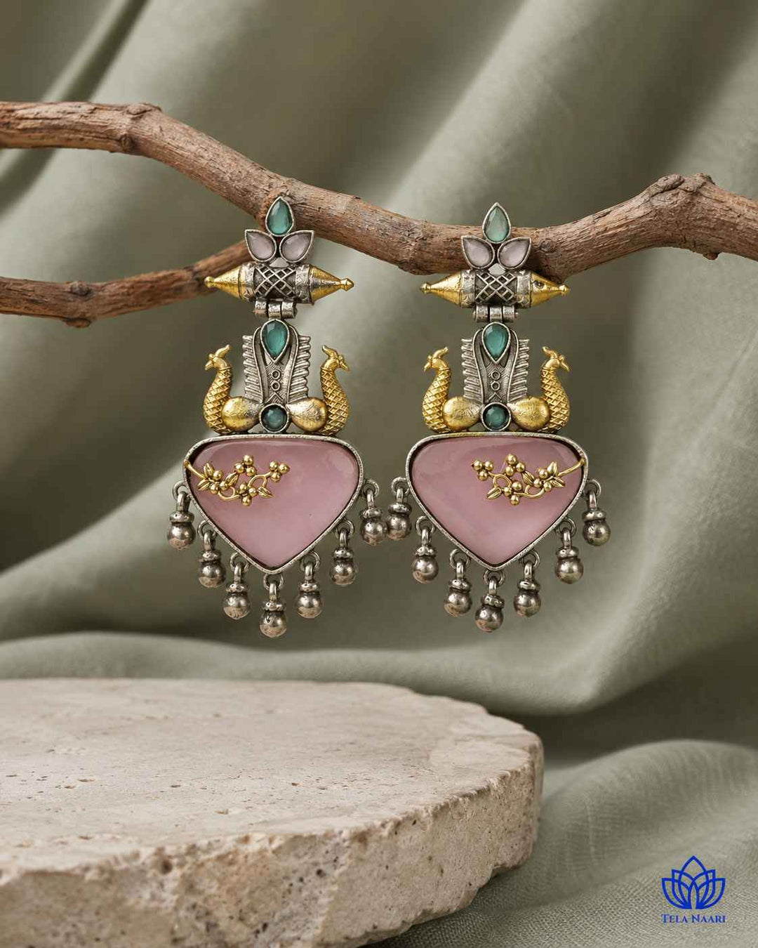 Brass construction with a silver-plated dual-tone finish forms the base design.