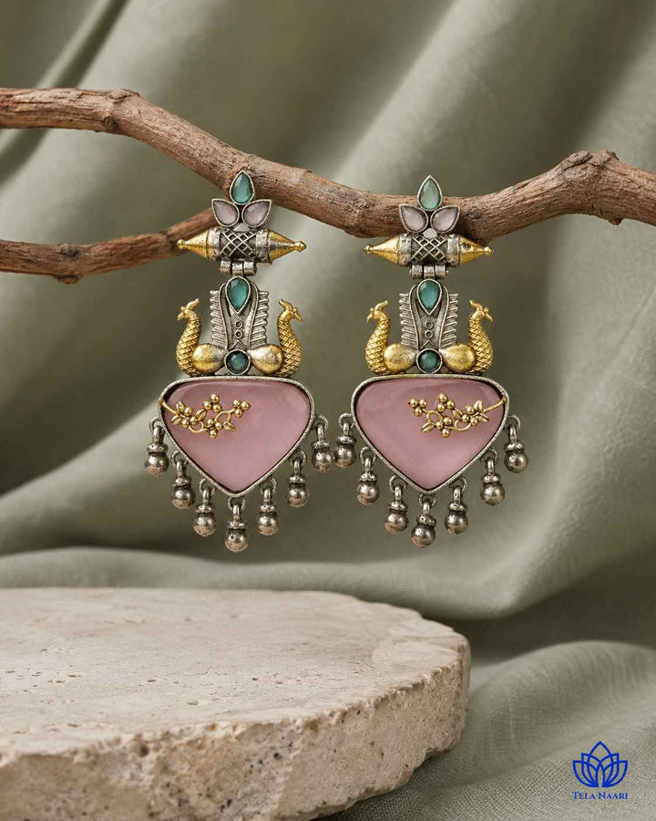 Brass construction with a silver-plated dual-tone finish forms the base design.