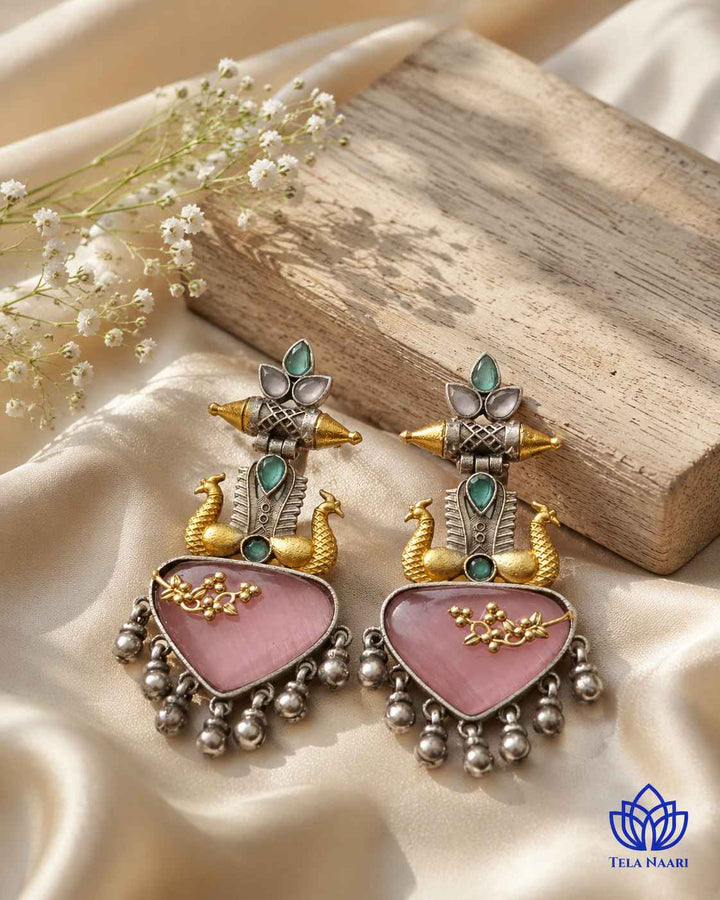 Post and back closure keeps this dual-tone silver-plated earring secure comfortably.
