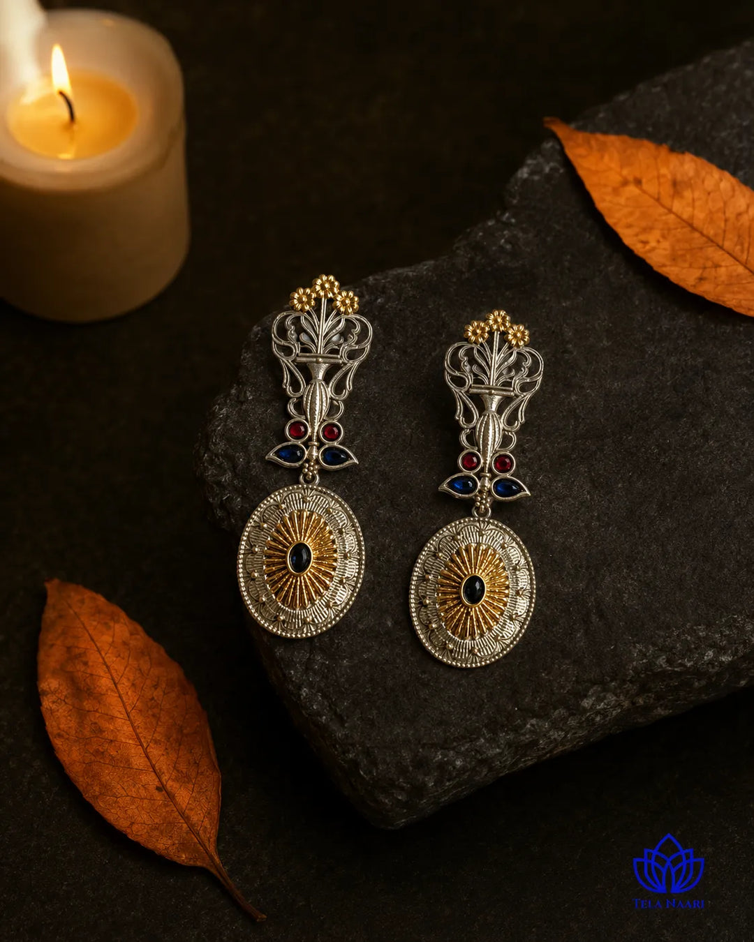 Silver-plated surface contrasts with the oxidised half of this earring.