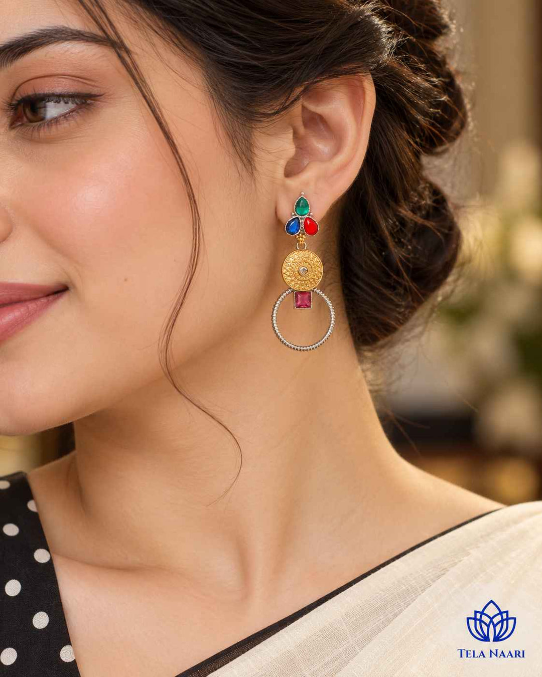 Dual-tone silver plating covers the surface of this earring.