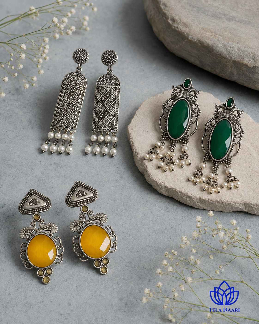 Dual-tone earrings from the Cynthia Hamper, a Raksha Bandhan gift for mother