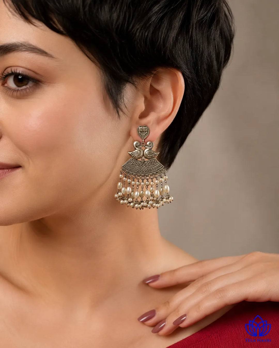 Charming duck detailing pairs with a lightweight silver-plated build.