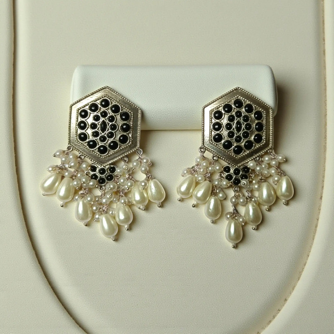 Elegant Gouri silver oxidised pearl earrings in black – handcrafted ethnic jewellery by Tela Naari
