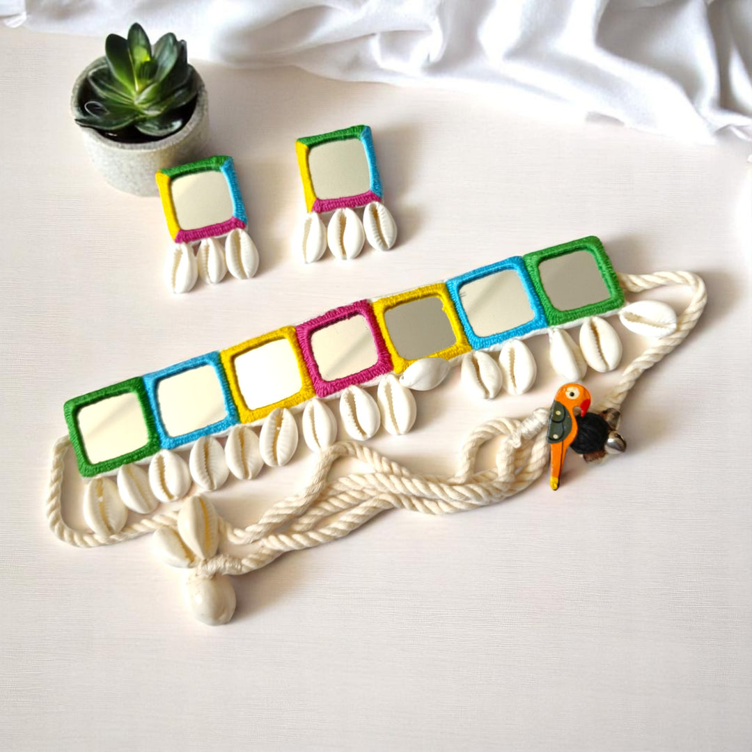 Premium fabric forms the base of this handcrafted mirror choker.