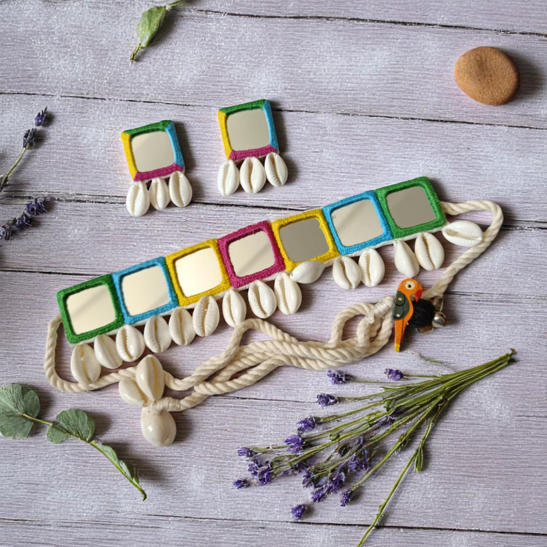 Natural shell accents catch the light across this fabric choker.
