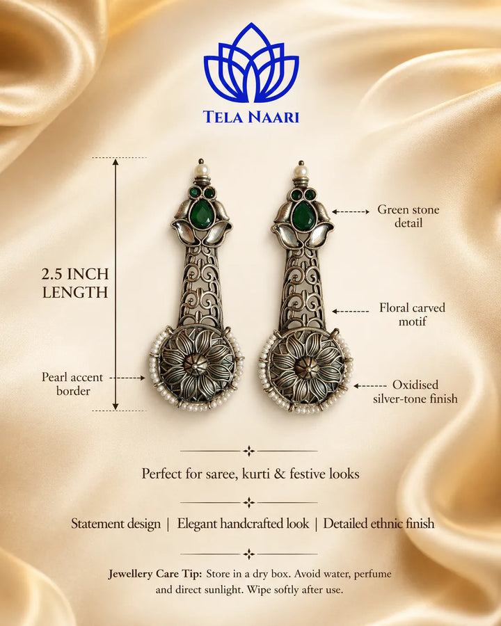 Artisanal detailing highlights the pearl accents of this earring.