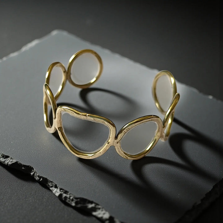 Adjustable open design lets this cuff bracelet fit most wrist sizes.