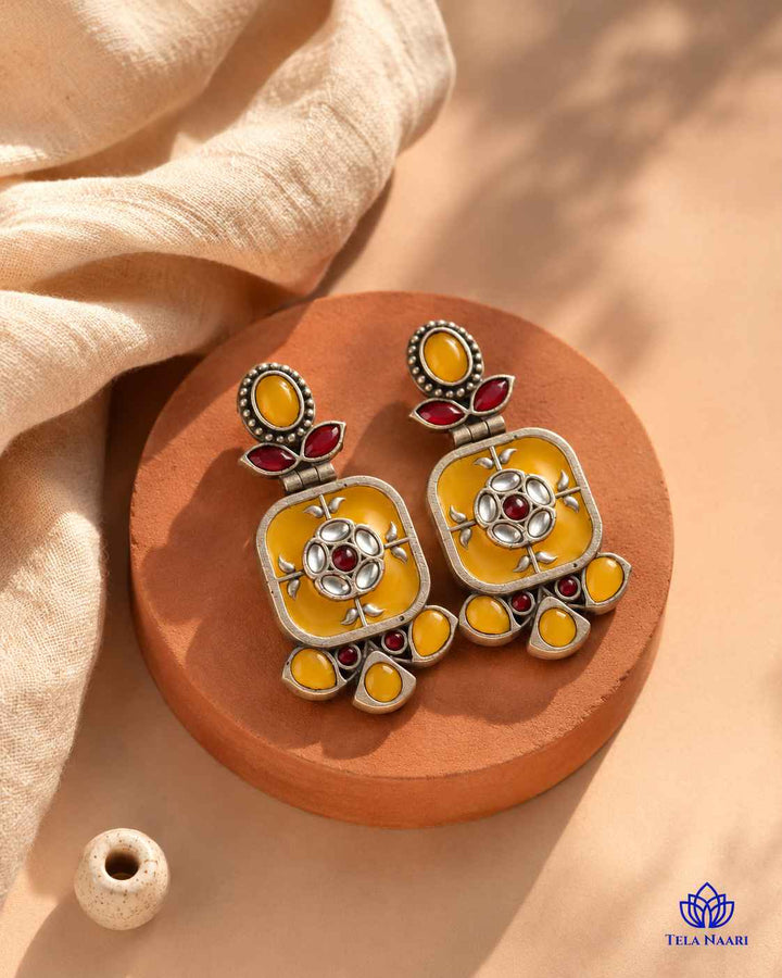 Easy-swing silhouette adds playful movement to this dangler earring.