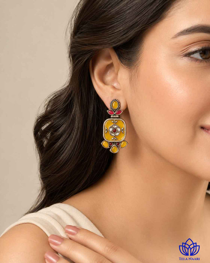 All-day wear feels light with this silver-plated yellow dangler earring.