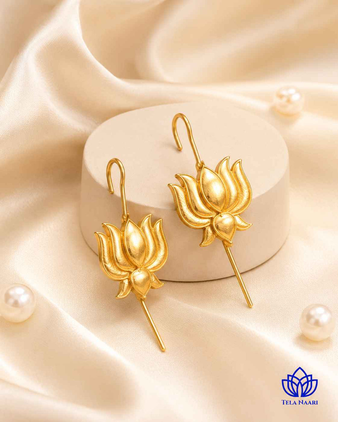 Lotus motif brings delicate, nature-inspired charm to this earcuff.