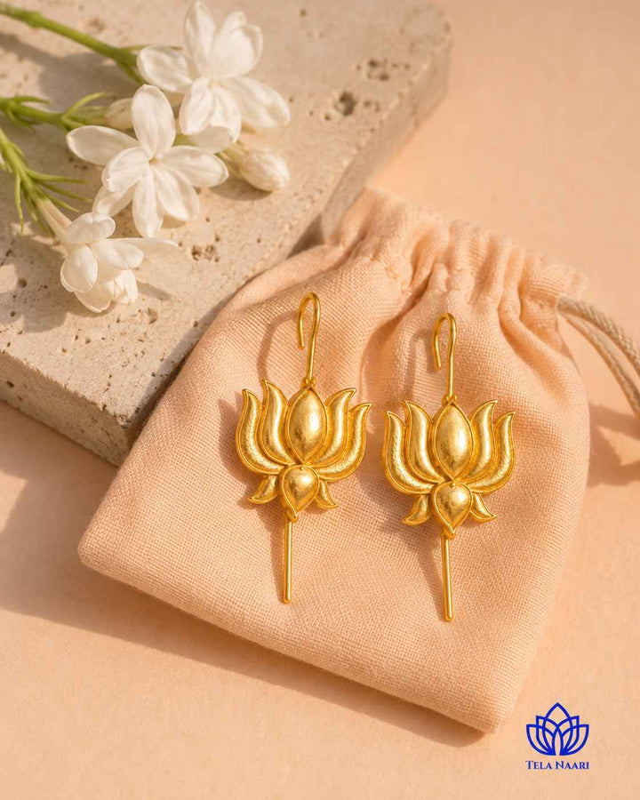 Delicate craftsmanship defines the petals of this lotus earcuff.