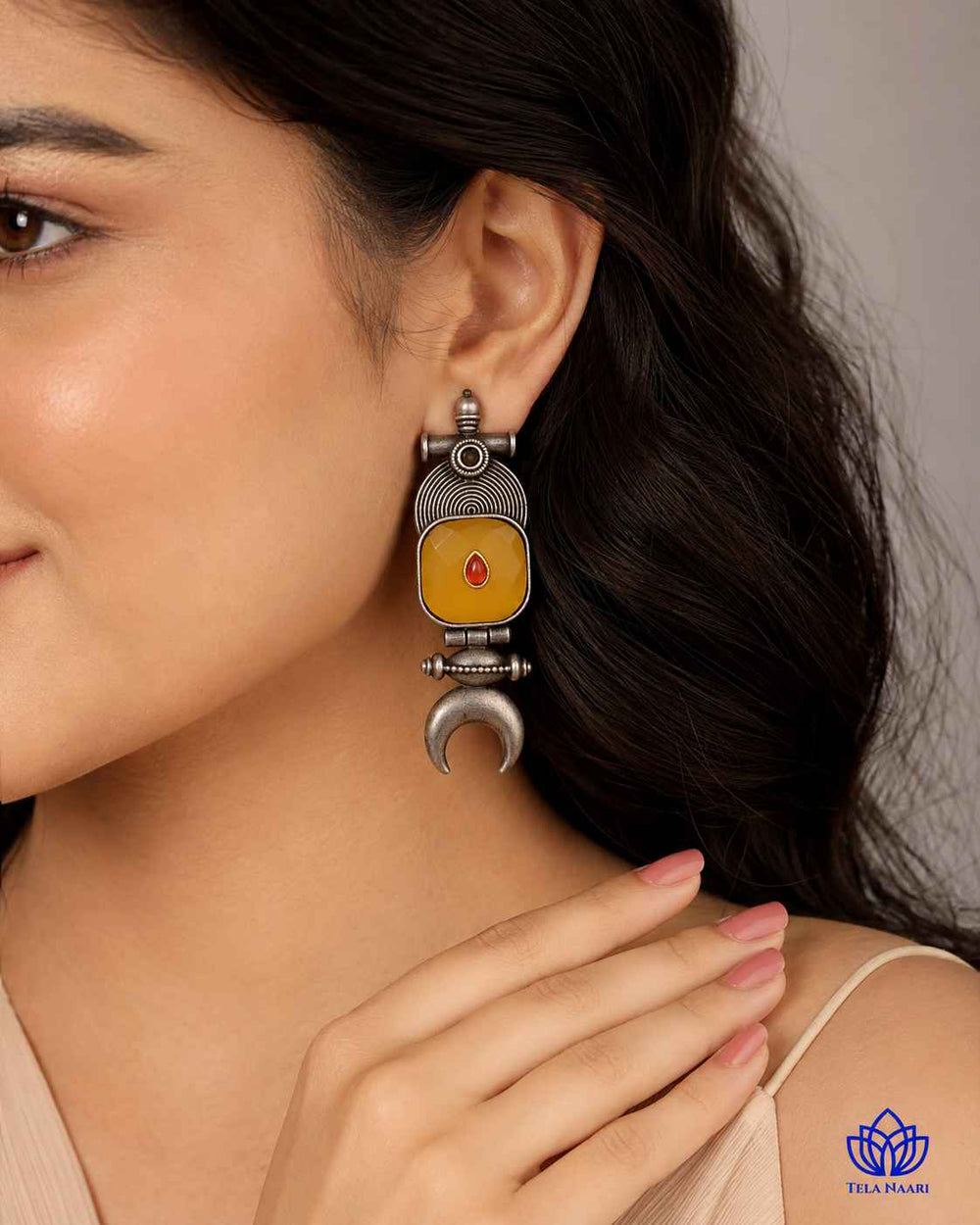 Yellow artificial stone detailing sits within the half-moon design.