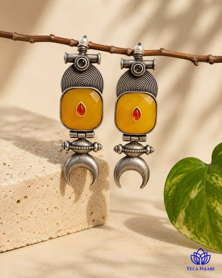 Lightweight build makes this half-moon earring easy to wear.