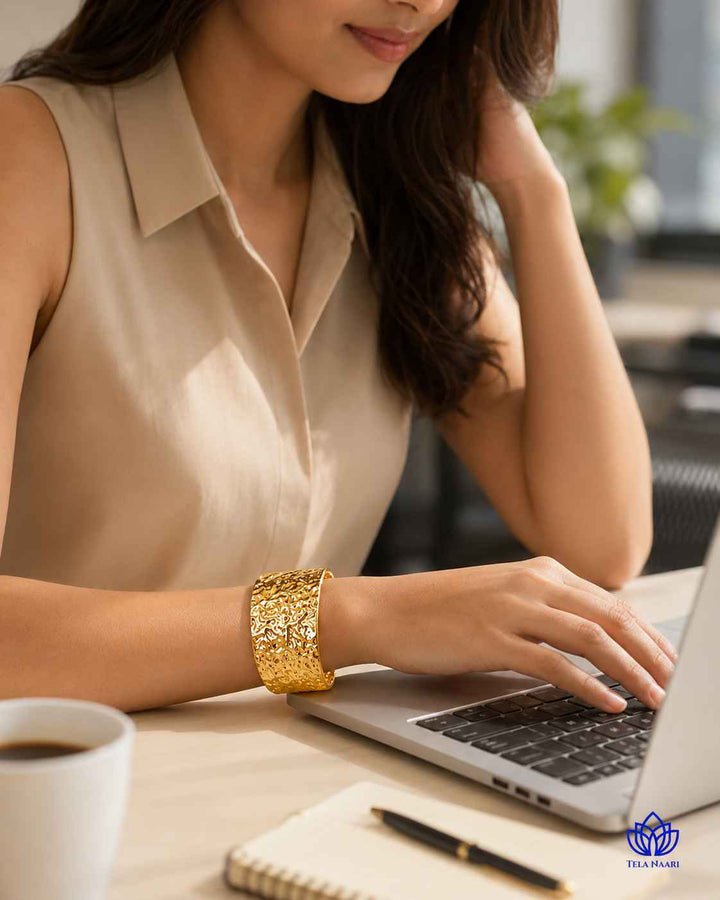 Layered wear pairs this hammered cuff with other bracelets easily.