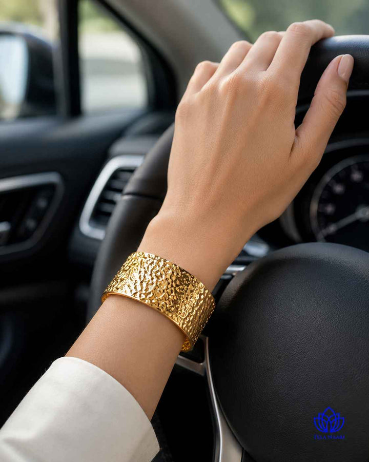 Sturdy build gives this hammered cuff its lasting durability.