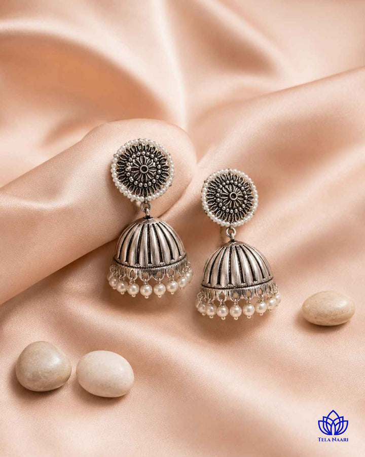 Lightweight build makes this oxidised earring easy to wear daily.