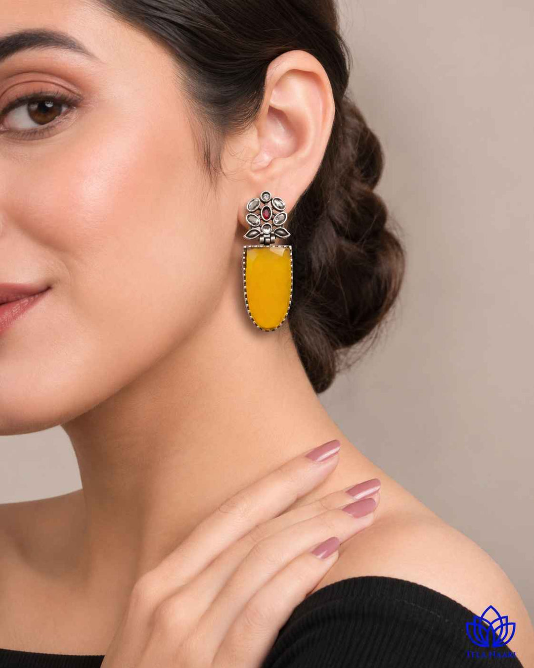 Contemporary silhouette pairs a bold shape with lustrous silver plating.