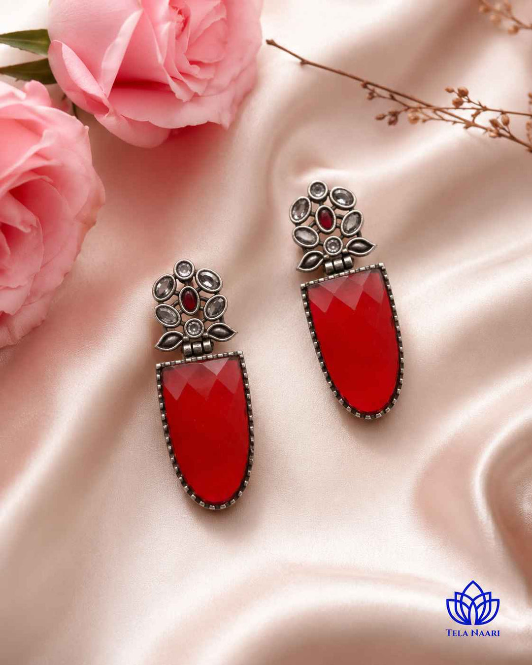 Earrings like this pair brass construction with lustrous silver plating.