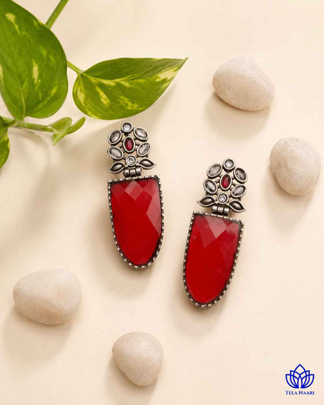 Unapologetic in colour, this red earring commands attention instantly.