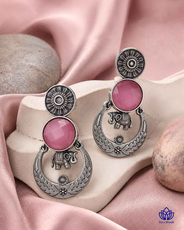 Silver-plated finish covers the surface of this stone earring.