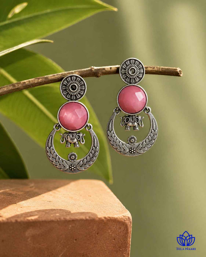 Yellow accent brings colour to this silver-plated stone earring.