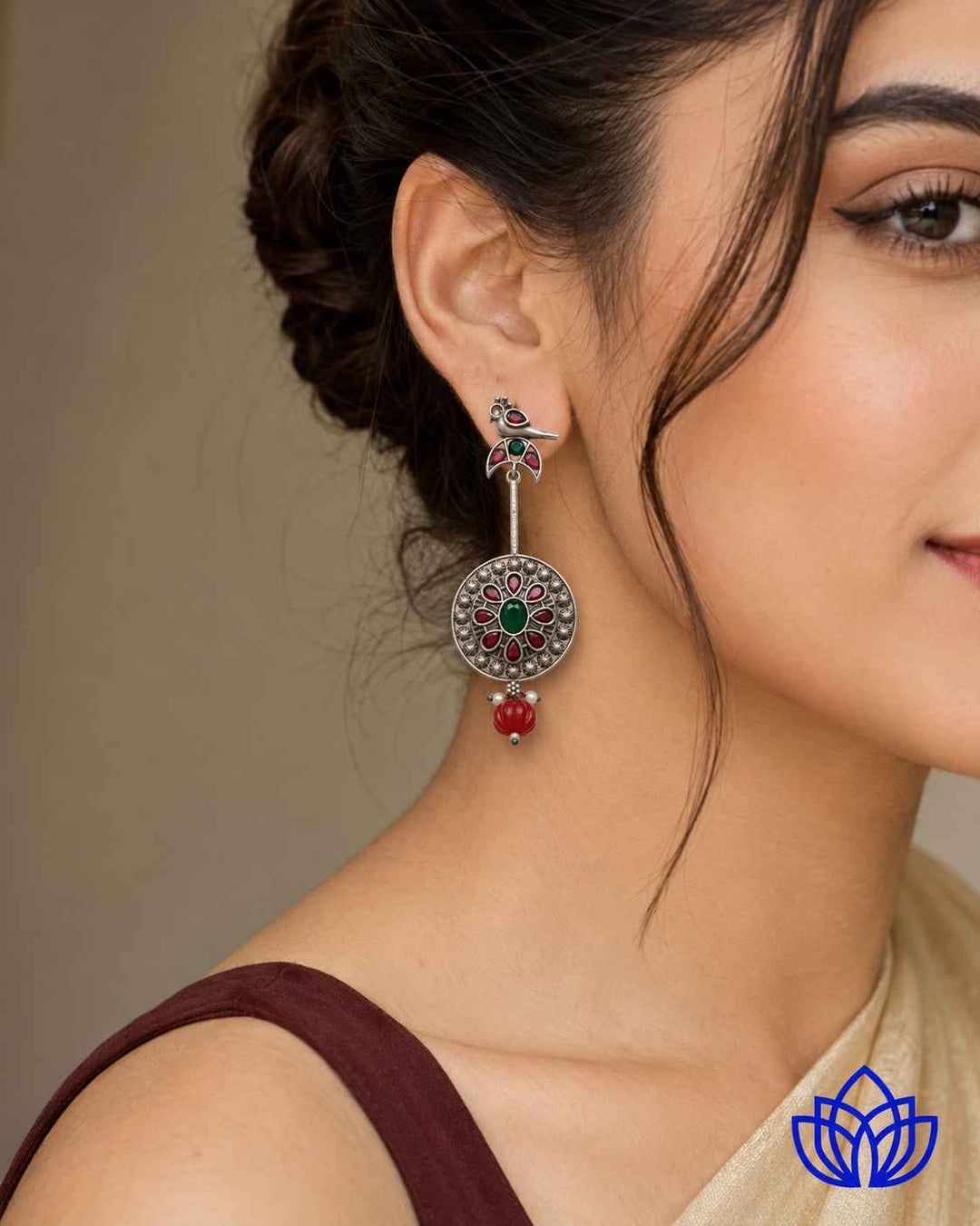 Avian-inspired bird motif brings quirky charm to this earring design.