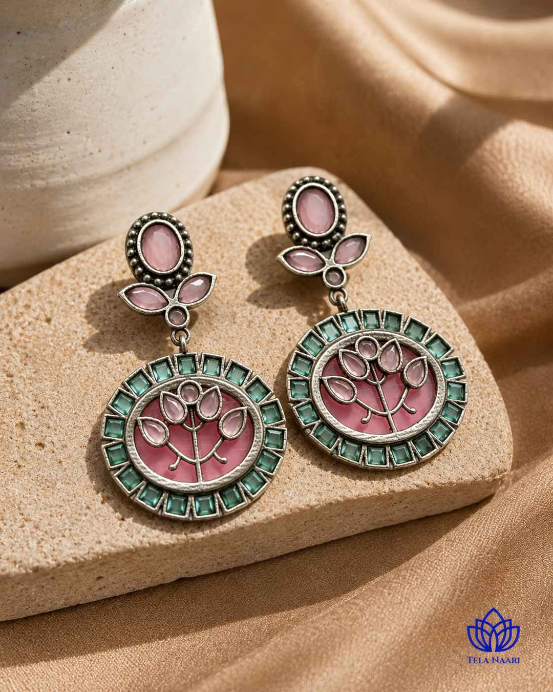 Glass bead accents highlight the multicolour stone detailing throughout.