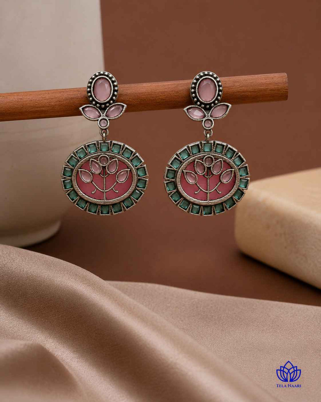 Versatile silhouette highlights the multicolour stone and bead work.