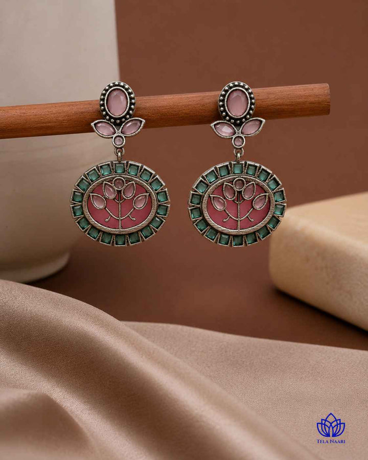 Versatile silhouette highlights the multicolour stone and bead work.