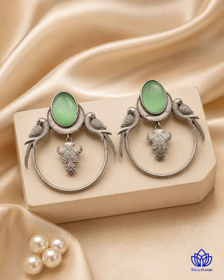 Silver-plated finish gives this earring a smooth, polished shine.