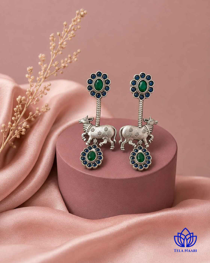 Oxidised polish gives this earring a textured antique finish.