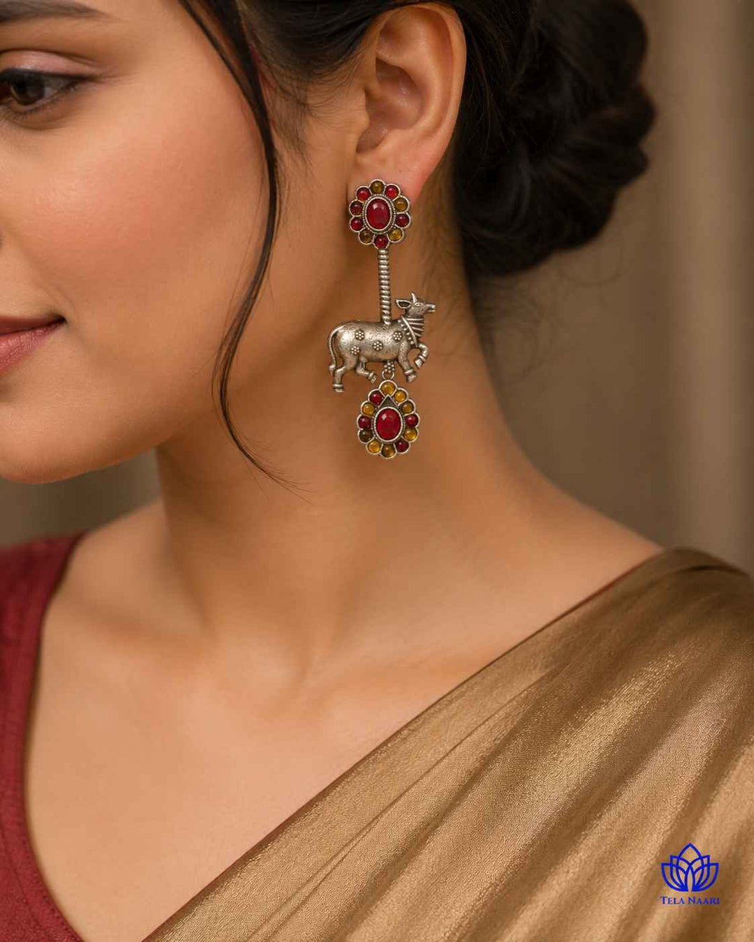 Whimsical Nandi bull motif shapes the silhouette of this earring.