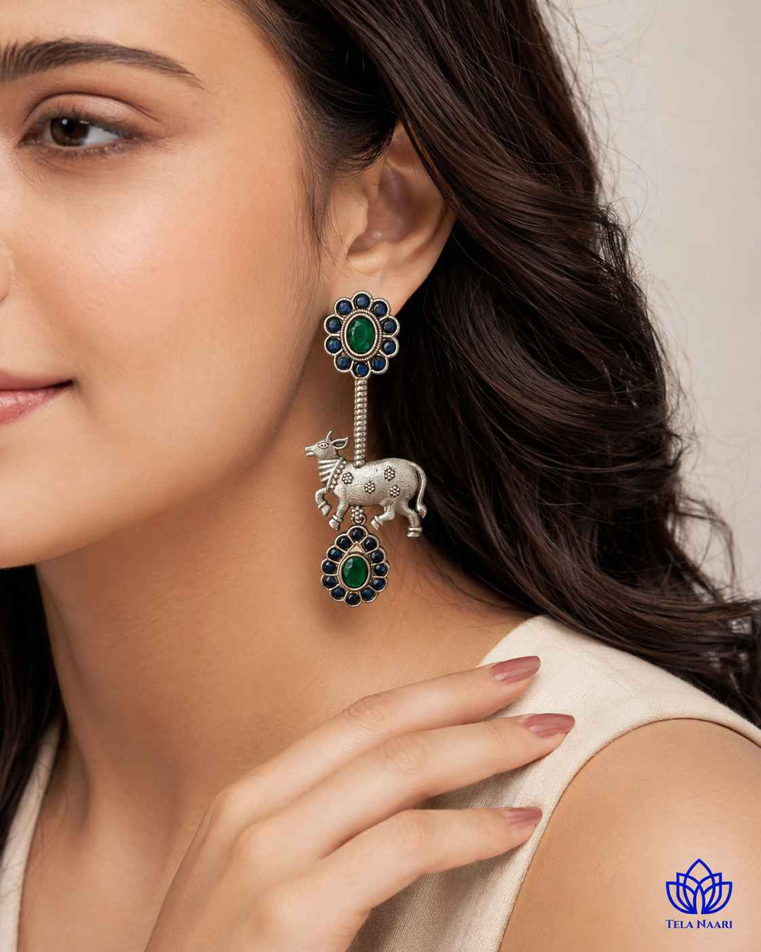 Whimsical detailing brings the Nandi motif to life in blue.