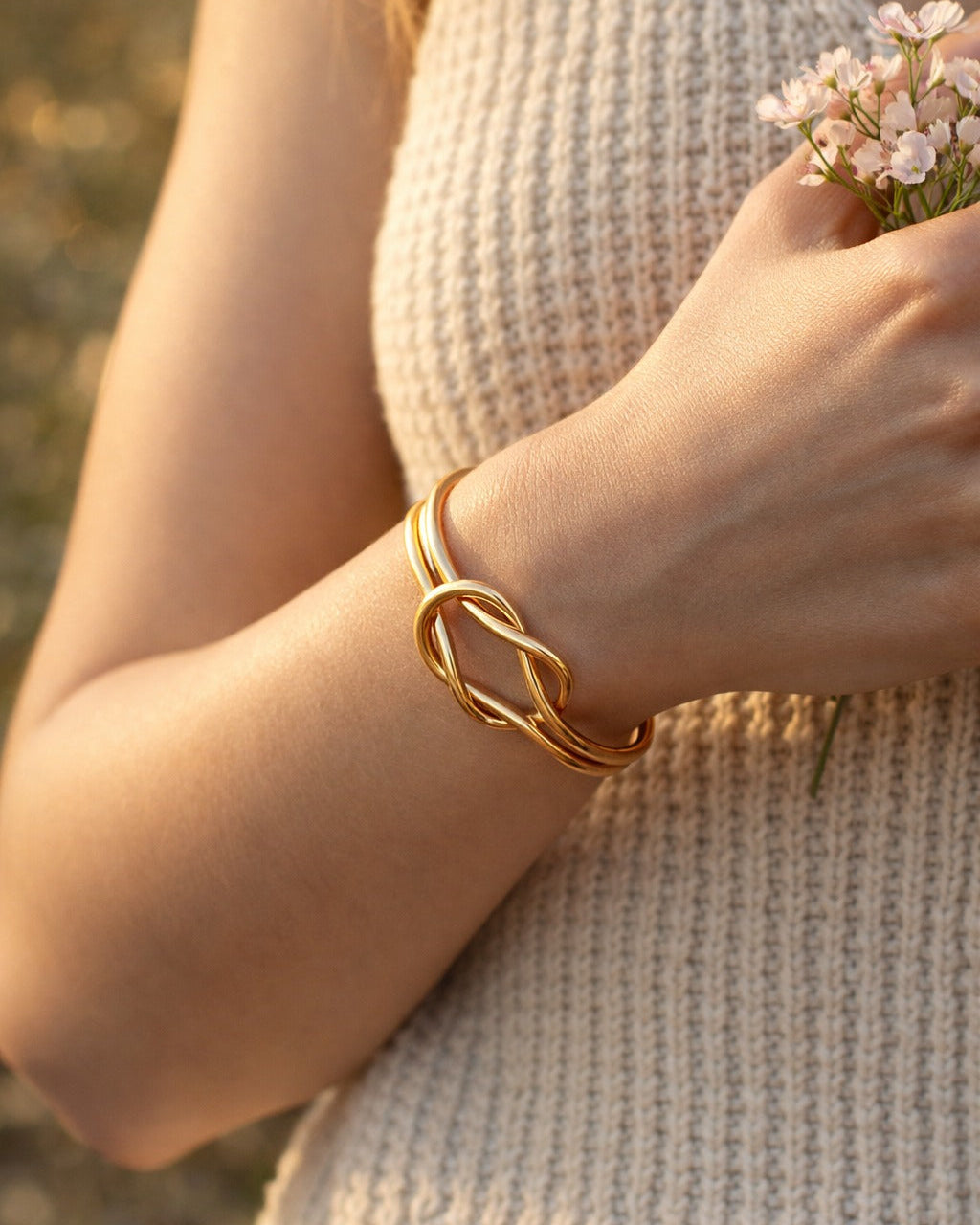 Open design lets this infinity knot cuff fit most wrist sizes.