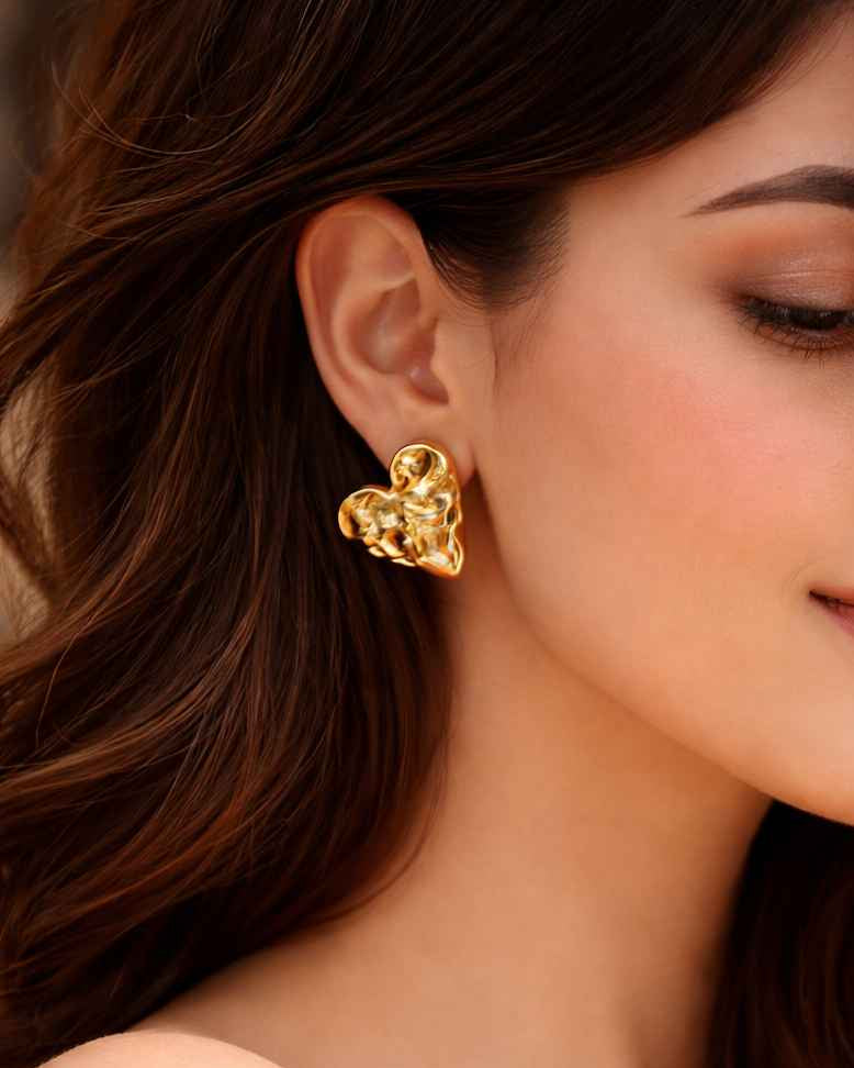 Hammered texture gives this heart-shaped stud its tactile design.
