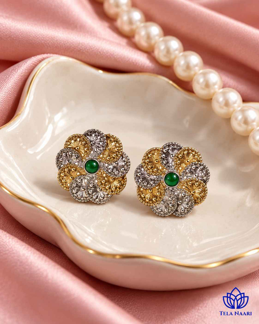 Kundan work adds texture to the silver-plated surface.