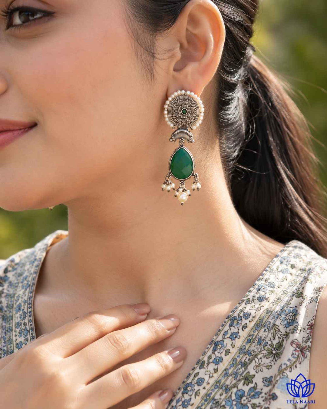 Versatile design pairs an oxidised finish with colourful stones.