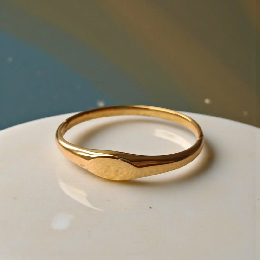 Stainless steel construction supports the wave design of this cuff.