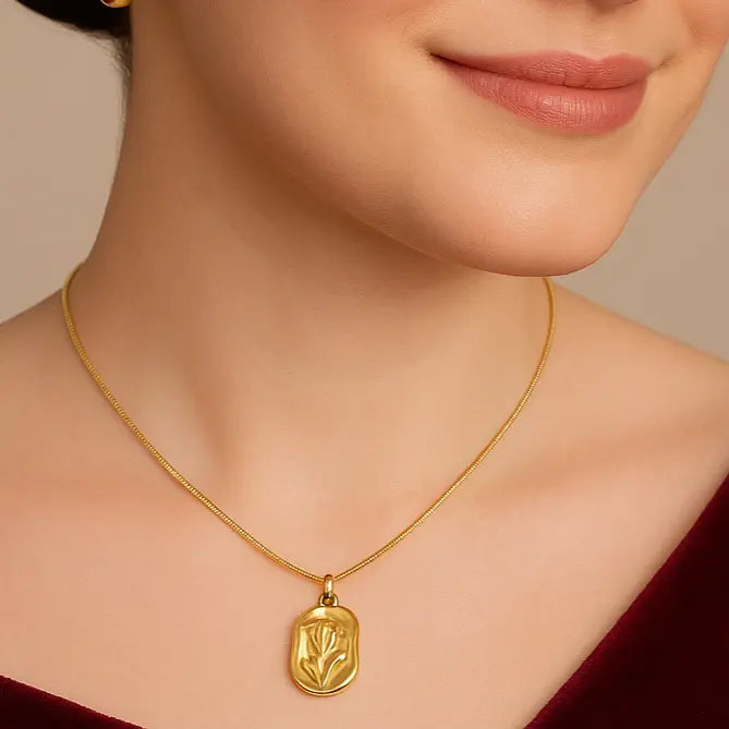 Woman wearing an anti-tarnish gold-plated tulip pendant necklace for a festive look-Tela Naari