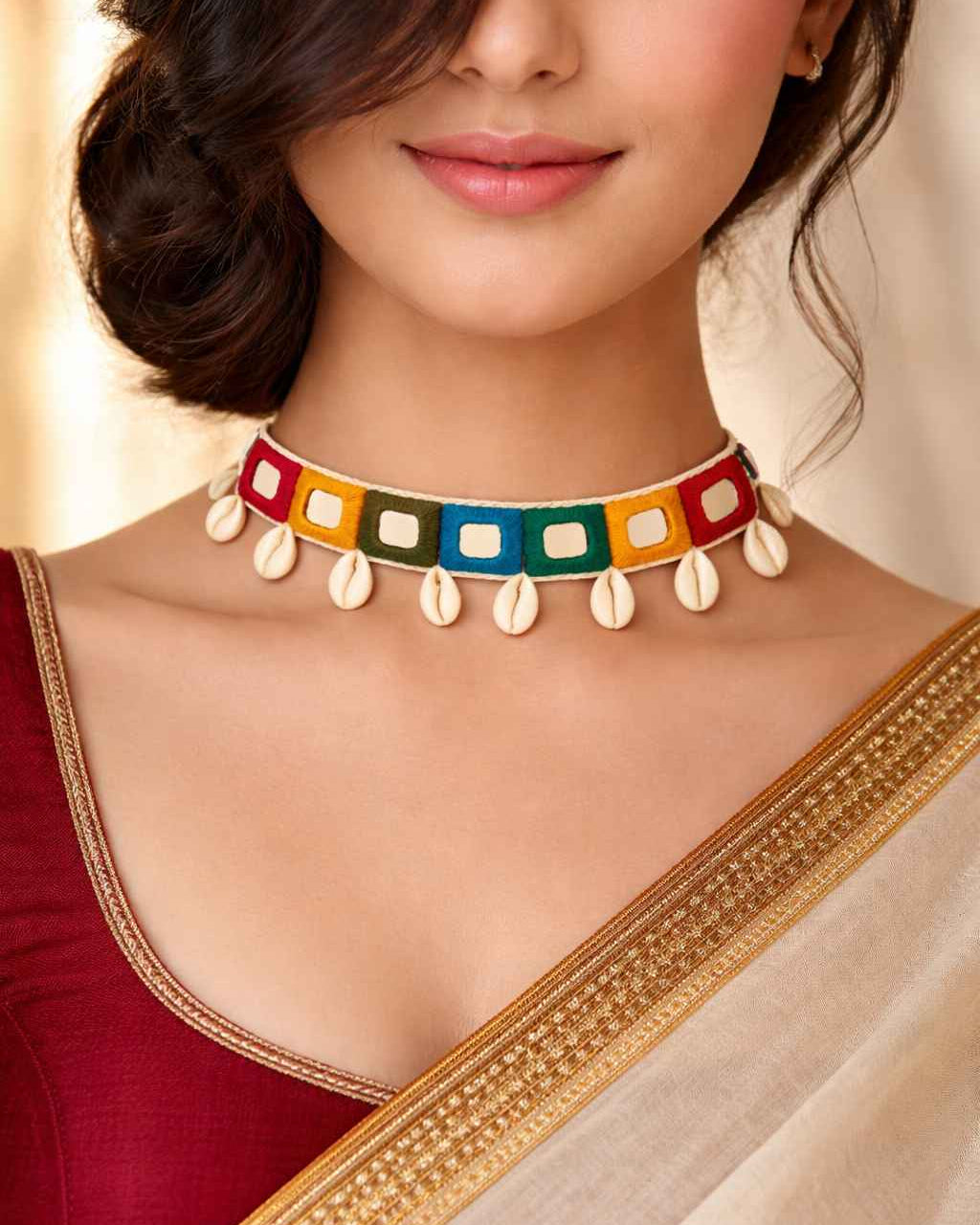 Colourful fabric hues shape the silhouette of this handmade choker.