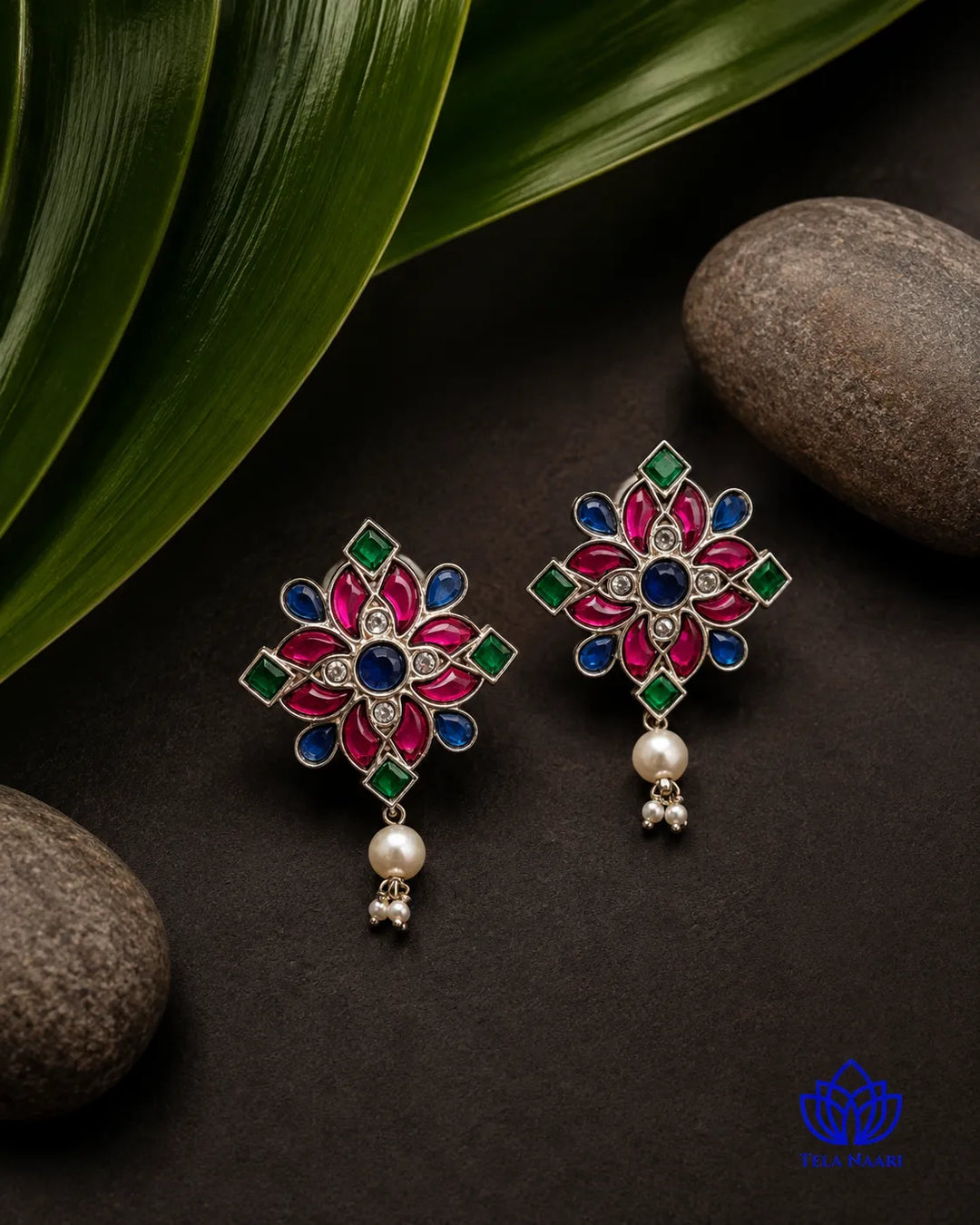 Antique oxidised finish gives this pearl stud its darkened charm.