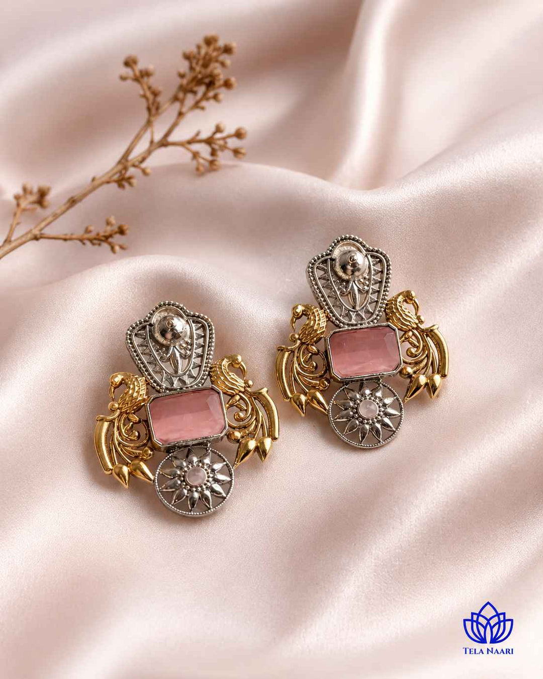 Oxidised texture contrasts with the pink dual-tone plating of this earring.