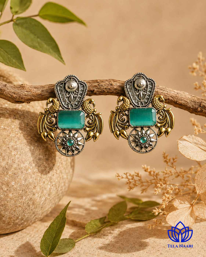 Brass construction supports the dual-tone plating of this earring.