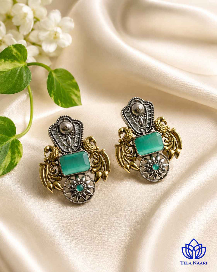 Fusion-ready silhouette pairs sea green with oxidised silver plating.