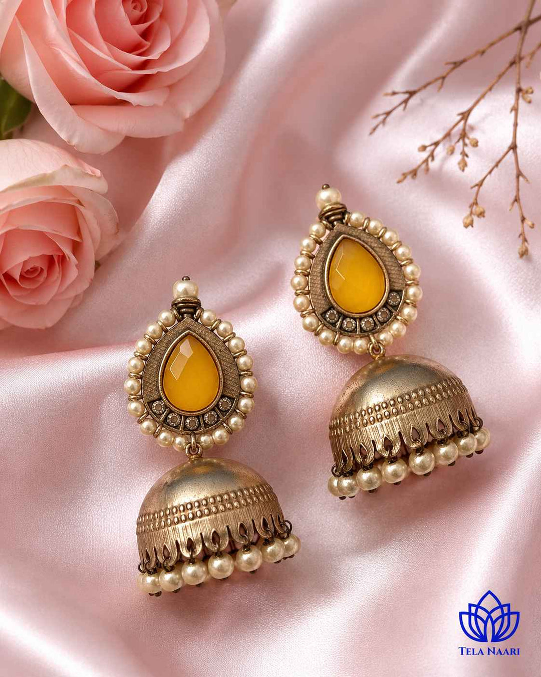 Brass construction with silver plating forms the jhumka&