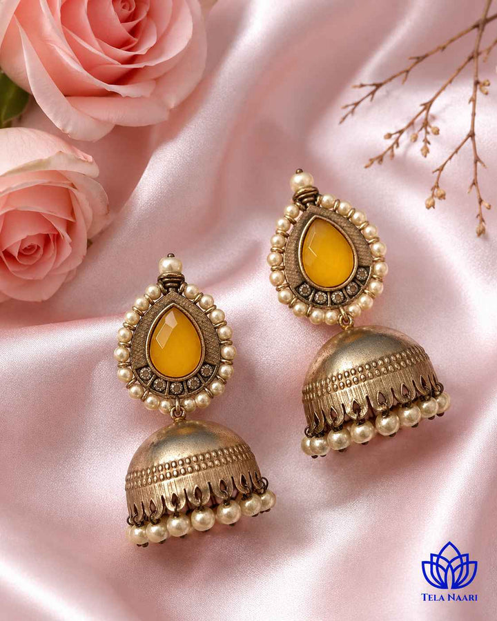 Brass construction with silver plating forms the jhumka&