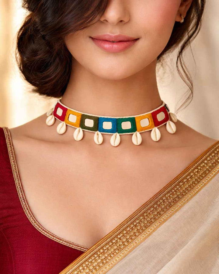 Breezy pastel mirrors shape the silhouette of this choker.