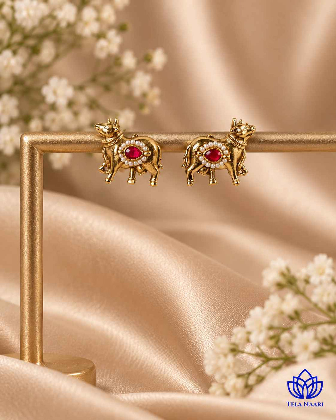 Post and back closure secures this dual-tone stud earring.